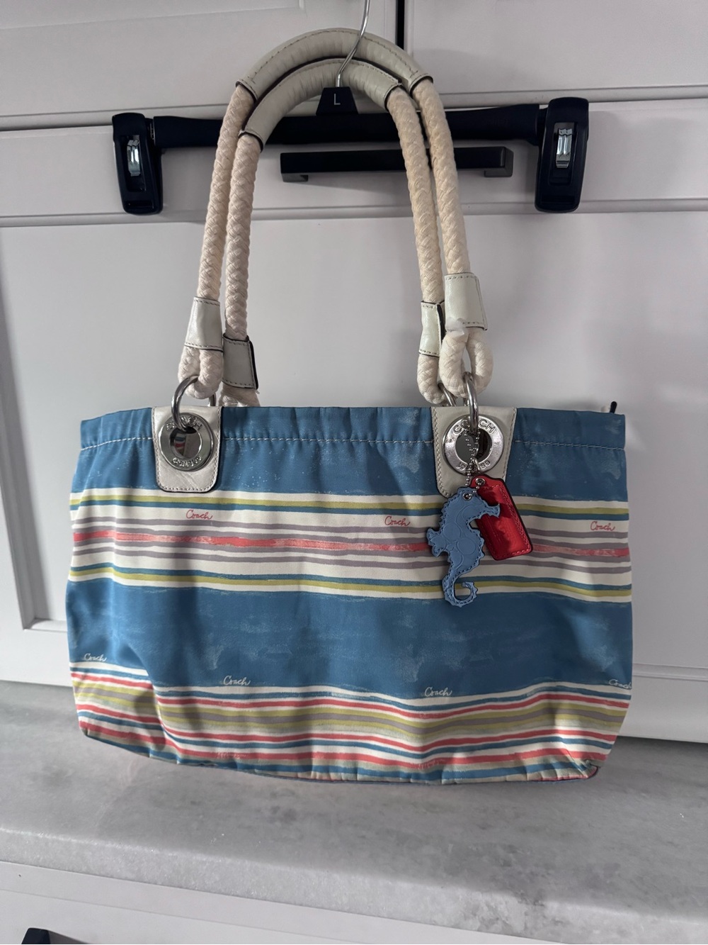 Coach Blue Striped Canvas Tote with Cream Rope Handles and Red/Blue Charms